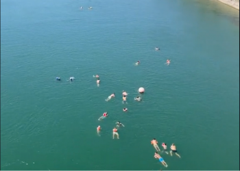 Watch These Swiss Commuters Float Down a River to Work